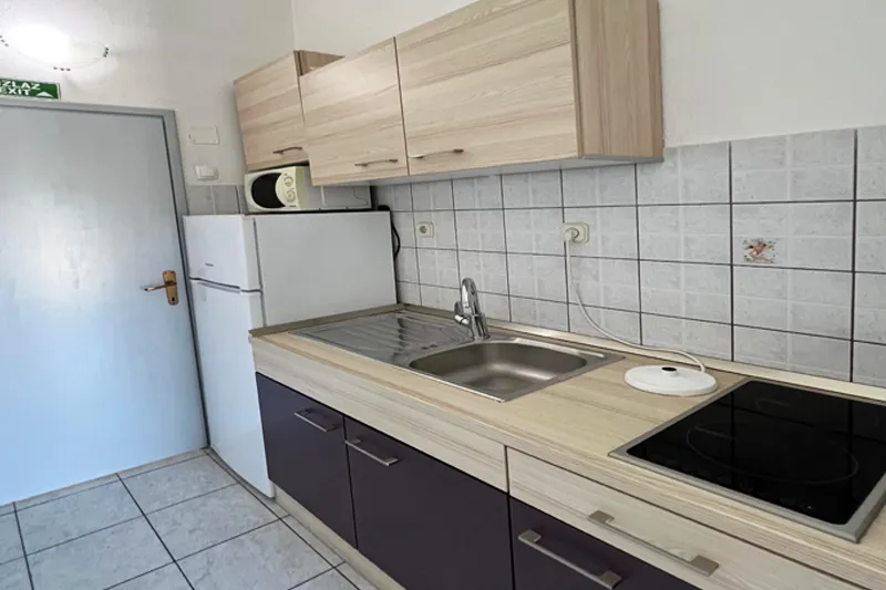 Apartment A6 – spacious accommodation in Podaca with sea view kitchen